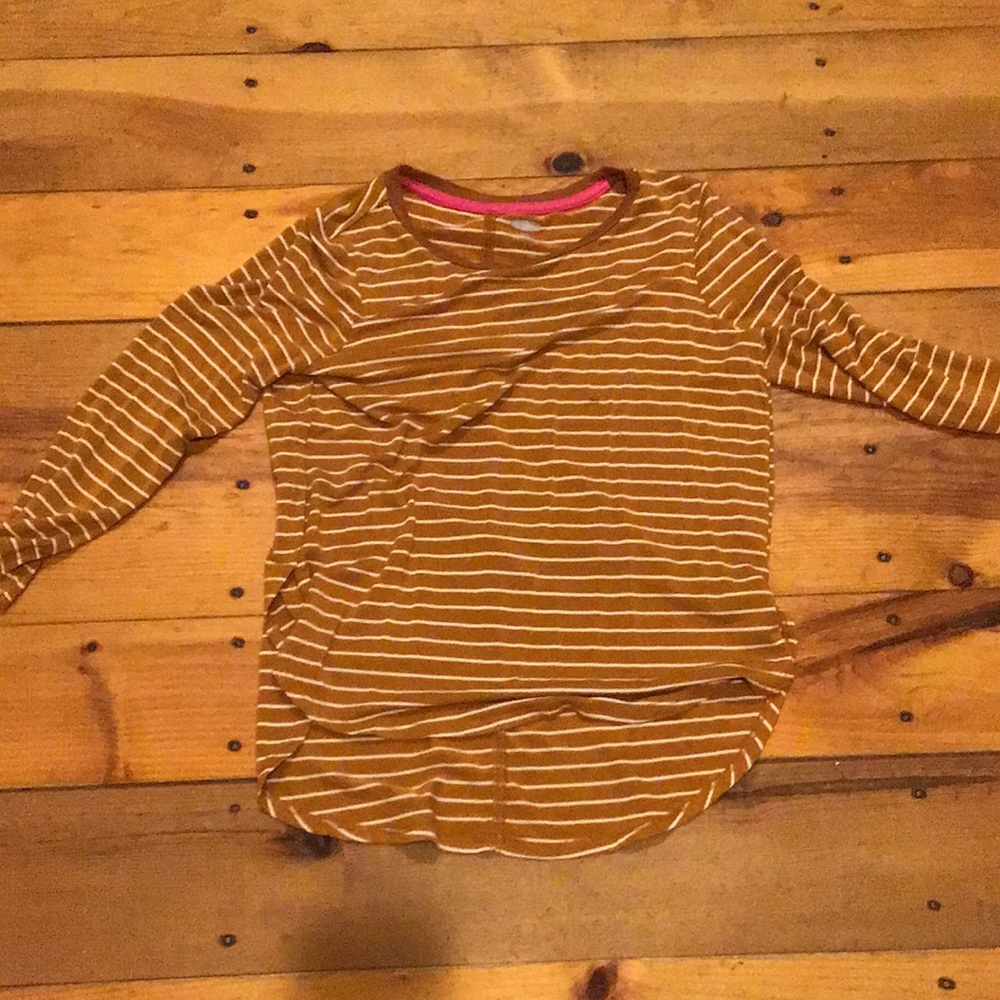 A mustard yellow. The stripes Are white. Old Navy